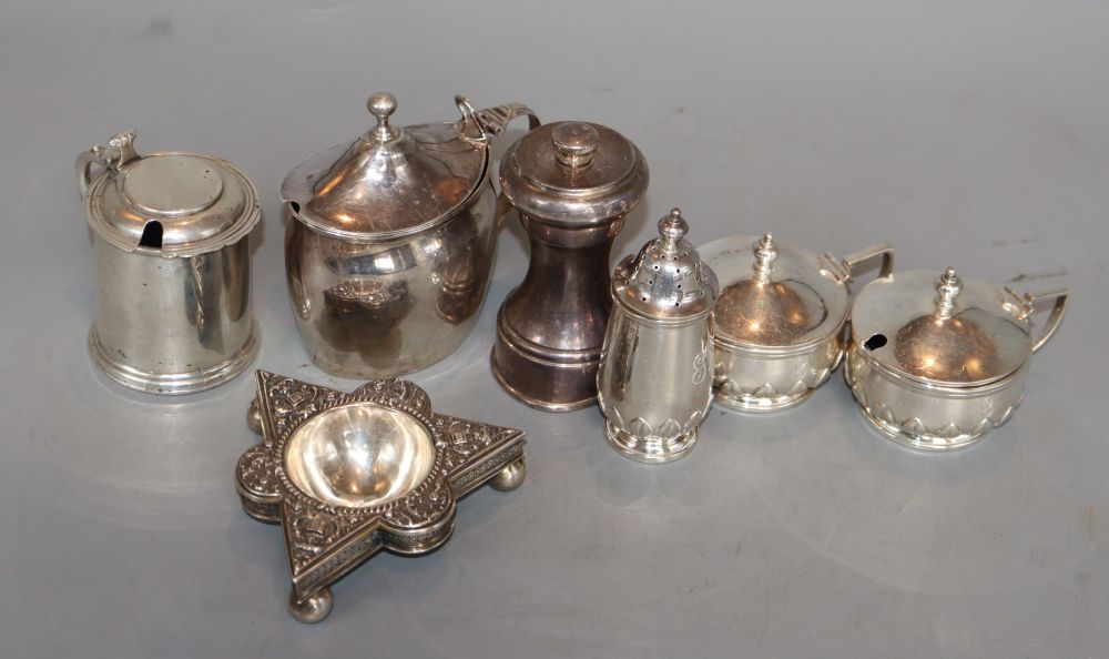 A Gorge V silver three piece condiment set, a George III silver mustard(lid a.f.) & 3 other items.